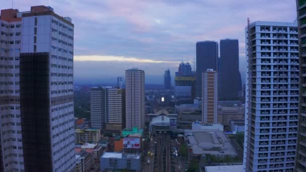 Makati City skyline and modern buildings business district of Metro Manila, Philippines. Aerial 4K - Filmmaterial, Video