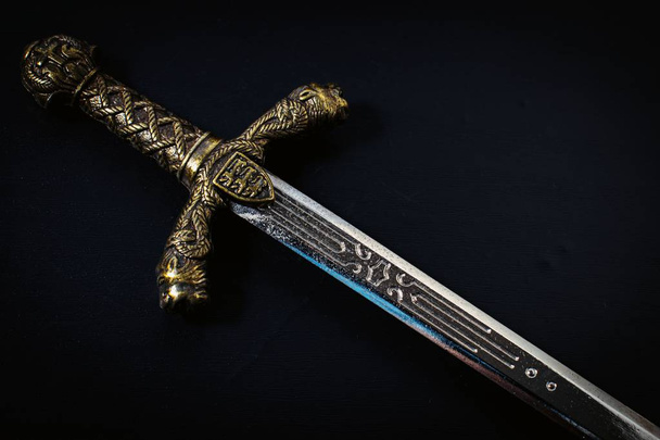 Knight sword on a black background - Photo, Image