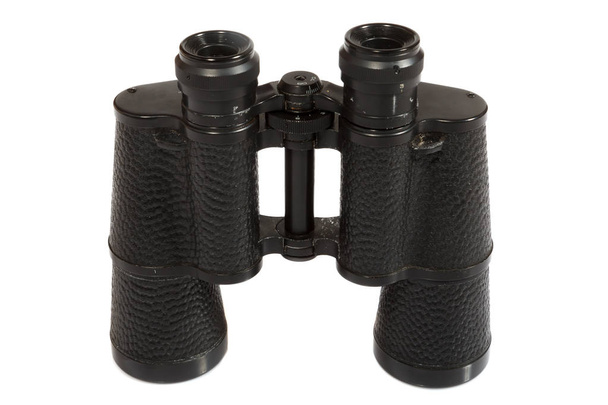 Black binoculars on white background. - Photo, Image