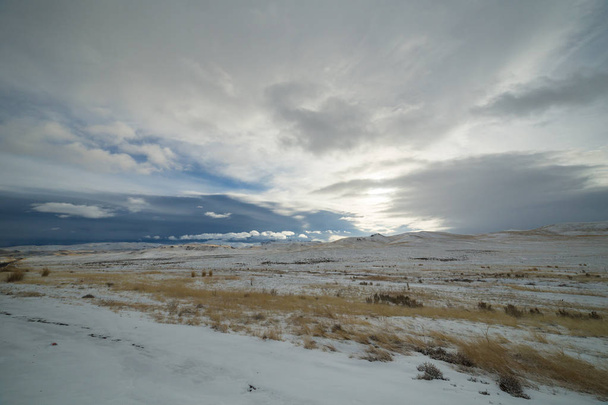 Cloudy morning in Idaho with snowy rural landscape - Foto, afbeelding
