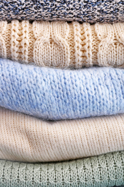 Stack of warm winter clothes, closeup - Photo, Image