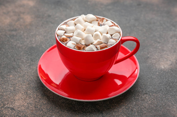 Cup of hot chocolate with marshmallows on dark background - Фото, зображення
