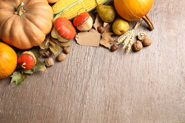 Flat lay composition with autumn vegetables on brown table, space for text. Happy Thanksgiving day - Foto, Bild