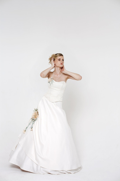 Beautiful blonde bride wearing wedding dress - Fotoğraf, Görsel