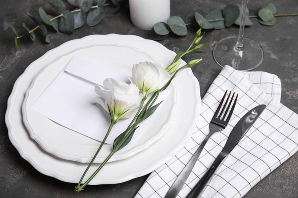 Elegant festive table setting on dark grey background - Photo, Image