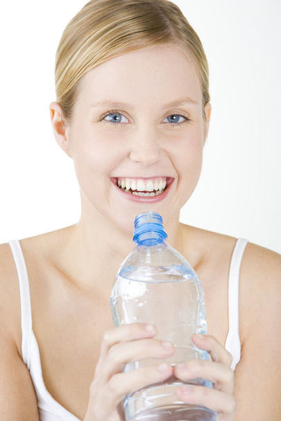 Woman with bottle of water - Fotoğraf, Görsel