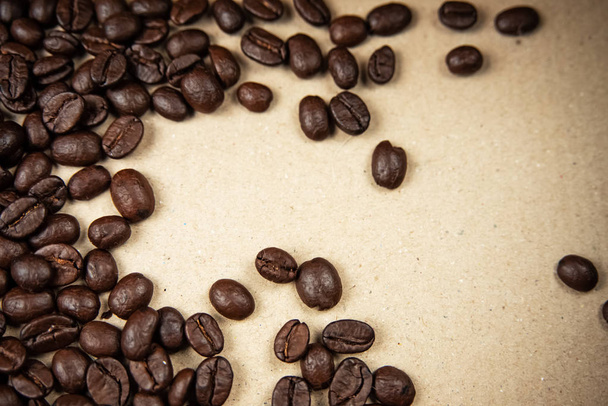 Closeup group of coffee bean on background,blurry light around - Фото, изображение