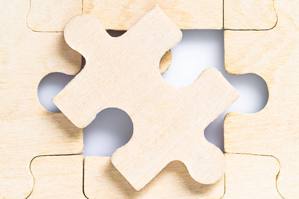 Blank wooden jigsaw puzzle  - Photo, Image