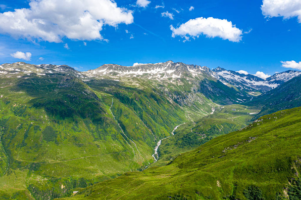 The Swiss Alps from above - amazing view over the mountains of Switzerland  - Valokuva, kuva