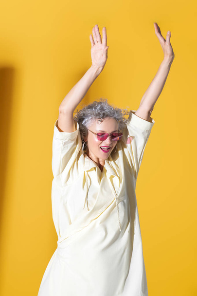 Mature woman feeling free and motivated while posing - Photo, image