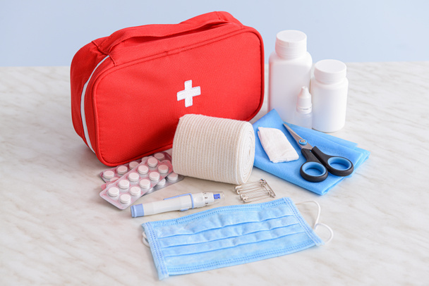 First aid kit on table - Photo, Image