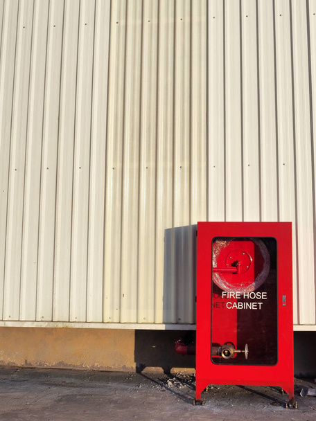 Fire Hose Cabinet Installed Outdoor of The Factory  - Photo, Image