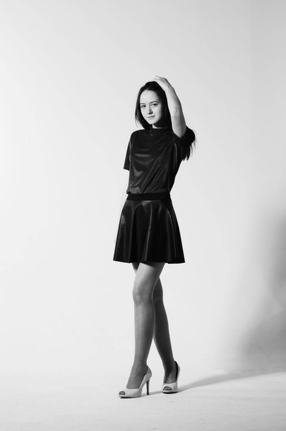 beautiful woman posing in Studio. Studio black and white photography - Фото, изображение