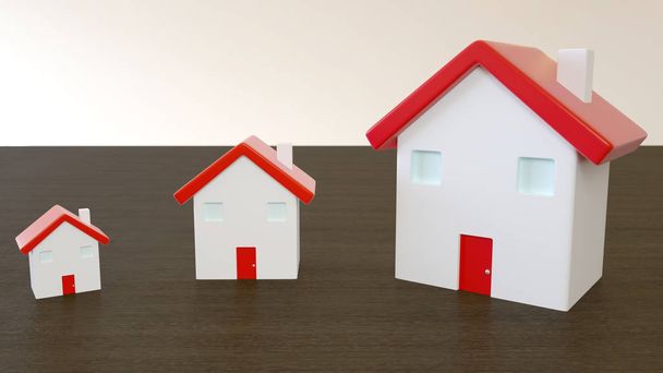 木製の赤い屋根を持つ3つのミニチュアの家、背景がぼやけている。不動産、住宅ローン、保険、住宅ローンのコンセプトのための画像. - 写真・画像