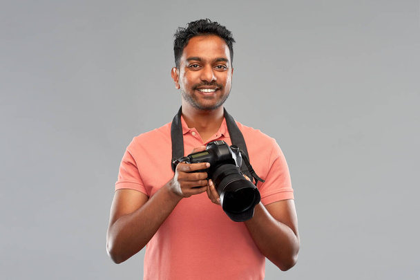 indian man or photographer with digital camera - Zdjęcie, obraz