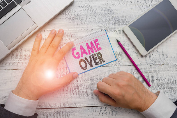 Conceptual hand writing showing Game Over. Business photo showcasing A situation in a particular sport that reach his finals or ending. - Photo, image
