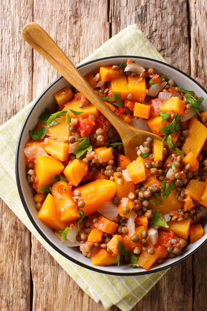 Homemade pumpkin ragout with lentils, onions and carrots in a bo - Photo, Image
