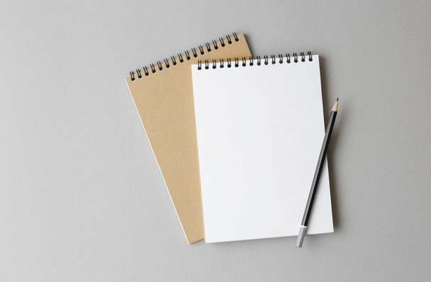 top view of a open notebook with pencil on a gray background - Фото, зображення