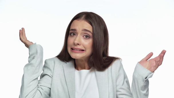 femme d'affaires confus montrant geste haussant les épaules isolé sur blanc
  - Séquence, vidéo