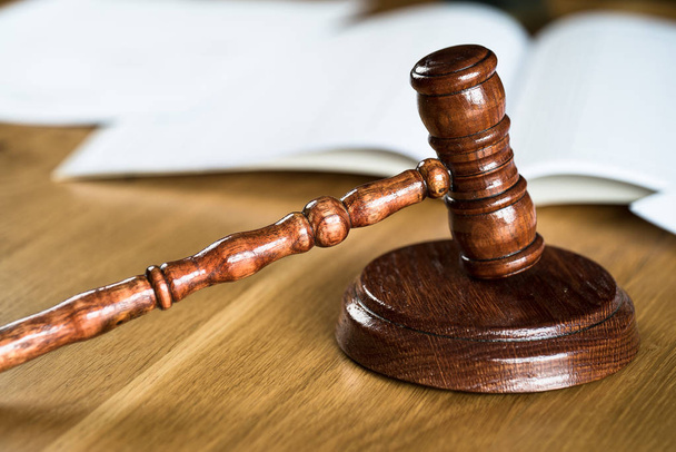 Law and Justice, judge gavel on wooden table with blurred background. - Photo, image