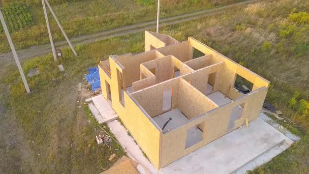 Construction of new and modern modular house. Walls made from composite wooden sip panels with styrofoam insulation inside. Building new frame of energy efficient home concept. - Footage, Video