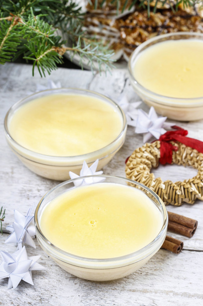 Delicious creamy vanilla pudding on christmas eve table - 写真・画像