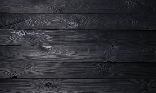 Black wooden background, old wooden planks texture - Fotó, kép