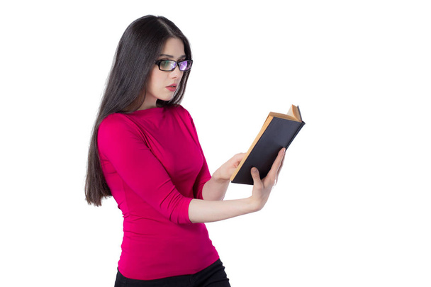 Attractive young woman in glasses with a book. - Foto, Bild