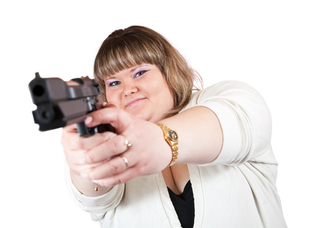 Girl aiming a black gun - Zdjęcie, obraz
