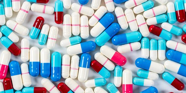 Monenlaisia lääkkeitä pillereitä kapselit tausta
 - Valokuva, kuva