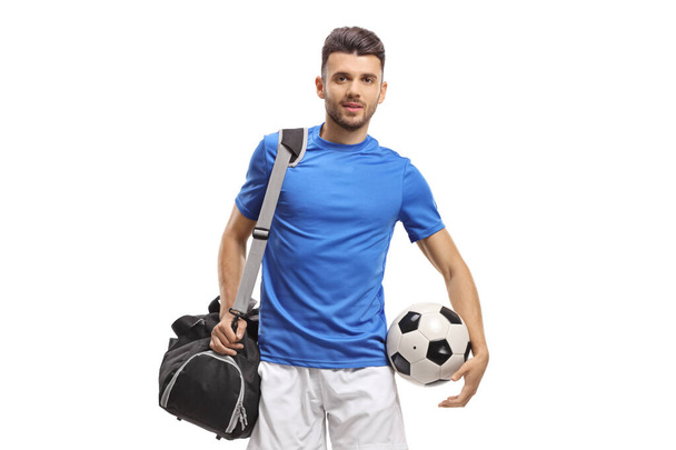 Footballer with a bag and a ball  - Φωτογραφία, εικόνα