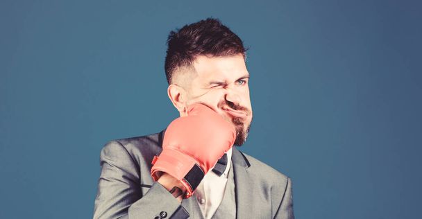 Challenging himself. powerful man boxer ready for corporate battle. businessman in formal suit and tie. knockout and energy. Fight. bearded man in boxing gloves punching. Business and sport success - Zdjęcie, obraz