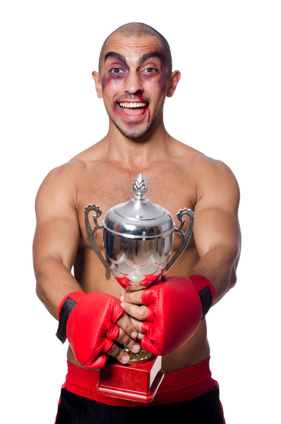 Badly beaten boxer with prize - Zdjęcie, obraz