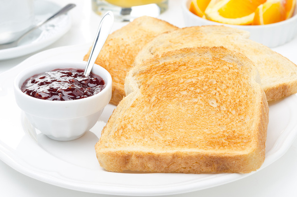 breakfast with toasts, jam, coffee and orange juice, horizontal - Фото, зображення