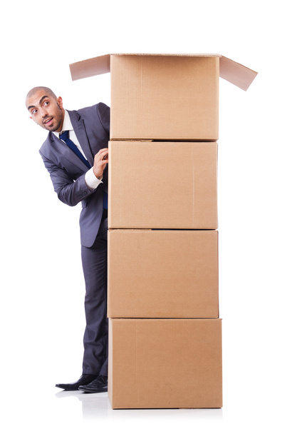 Бизнесмен со стопкой коробок
 - Фото, изображение