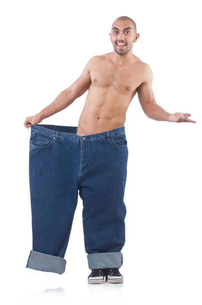 Man in dieting concept wearing oversized jeans - Foto, Imagem