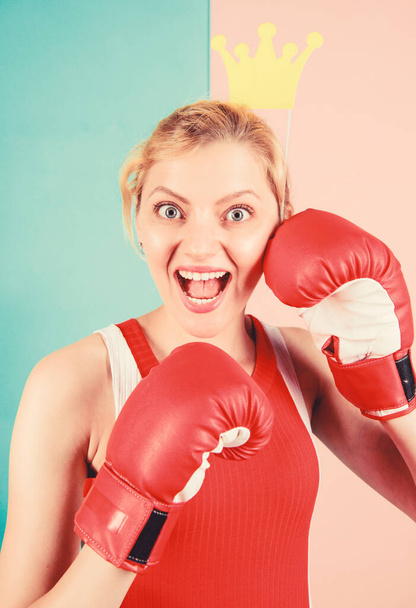Workout done, have your fun. Cute boxer girl with party prop. Funny woman with crown prop in boxing gloves. Athletic woman in sports wear. Sportswoman with princess look. Boxing is fun for her - Foto, immagini