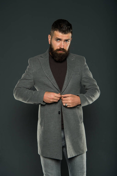 Classy but modern. Fashion outfit. Masculine look. Brutal hipster man. Hipster wearing casual clothes. Hipster beard and stylish haircut. Bearded man trendy hipster style. Monochrome style outfit - Foto, afbeelding
