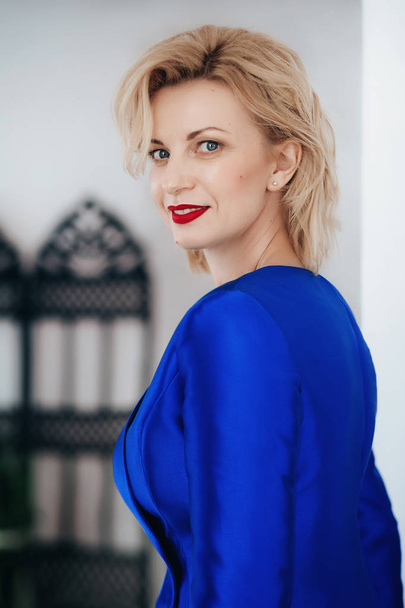 beautiful young woman in blue dress - Фото, зображення