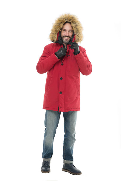 Staying warm in winter. Bearded man in winter fashion. Mature man in hooded coat isolated on white. Adult model enjoy winter style. Cozy winter outfit - 写真・画像