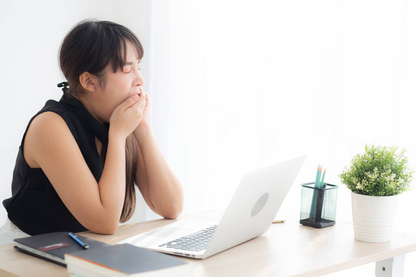 beautiful young freelance asian woman working bored and tired on - Photo, Image