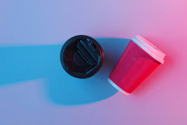 Minimalist closed plastic coffee containers, neon light - Photo, Image