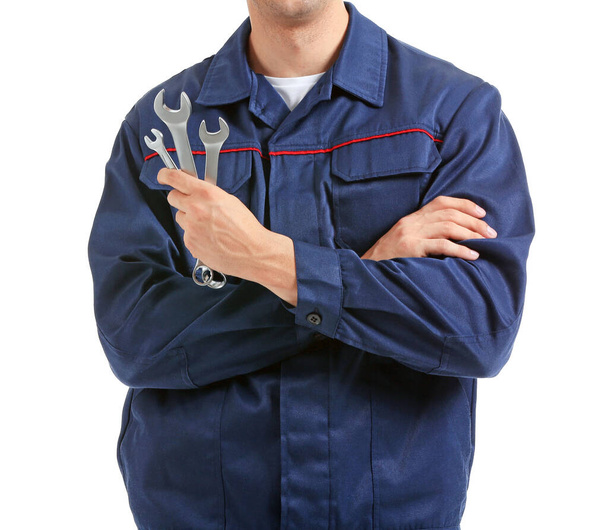 Male car mechanic on white background - Foto, afbeelding