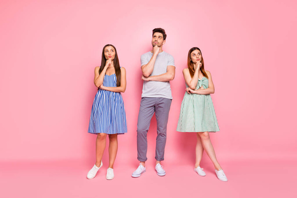 Full length photo of minded people touching their chin looking having thoughts isolated over pink background - Foto, Bild