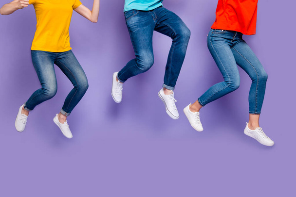 Cropped closeup photo of cheerful crazy ecstatic group of people running marathon hurrying to get seasonal discounts isolated violet background - Fotó, kép