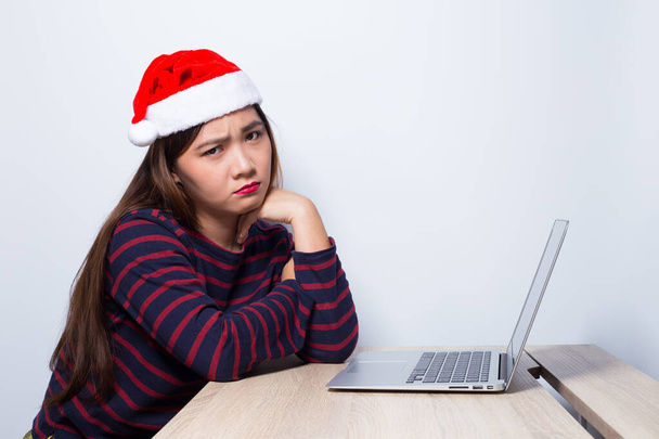 Sad woman at work in holiday - Фото, изображение