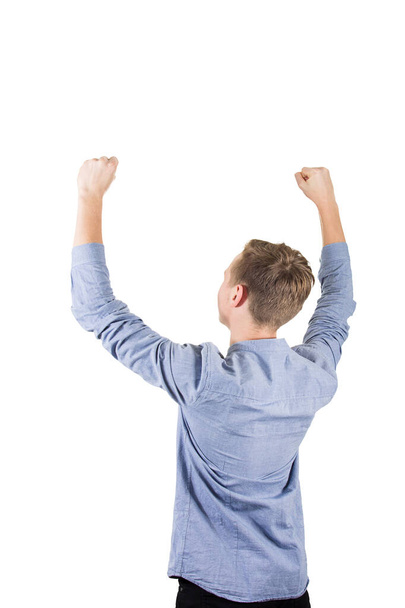 Vista trasera de estudiante exitoso adolescente levantando las manos es
 - Foto, Imagen