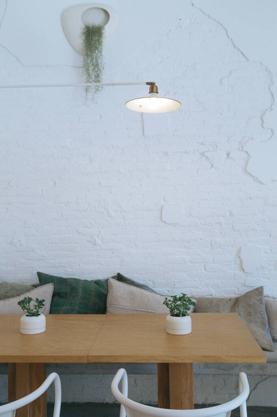 interior concepts on white brick wall and lamp and modern chairs - Фото, изображение