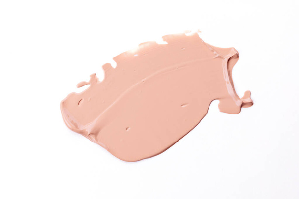 Liquid Foundation Smudge On White Background. Close Up Of Cosmetic Makeup Cream Sample Isolated On White. - Foto, afbeelding