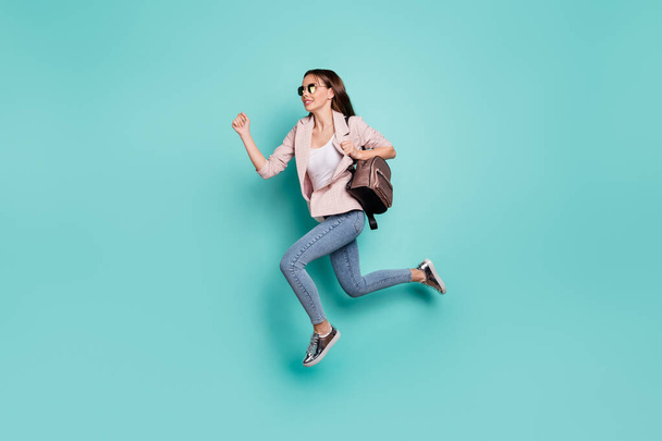 Full length body size view of nice-looking attractive cheerful cheery sportive straight-haired lady having fun running fast isolated over bright vivid shine blue green teal turquoise background - Фото, изображение